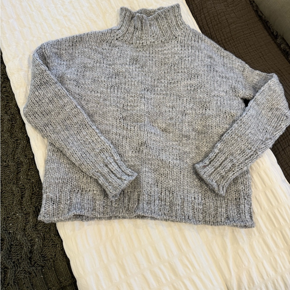 Cable knit mock neck sweater